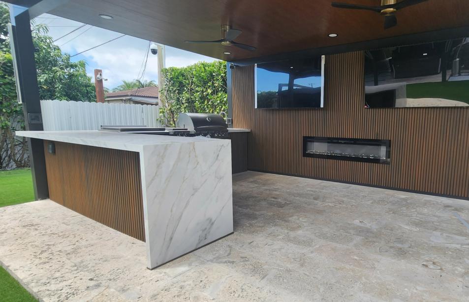 Outdoor kitchen and pergola with imitation wood walls