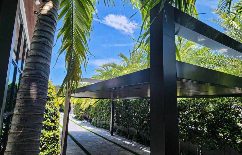 Long pergola with four columns and LED lighting system